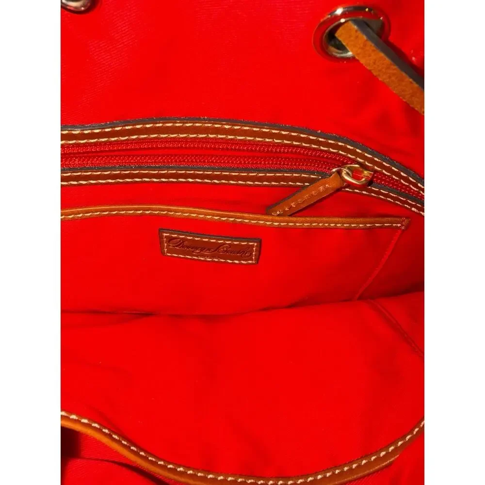 Dooney & Bourke Pebble Grain Drawstring Bucket Bag Blue Leather Red Interior